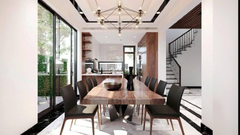 Trong bố trí nội thất phòng ăn biệt thự theo phong cách hiện đại, sự sử dụng của đèn không chỉ để chiếu sáng mà còn có tác dụng kích thích sự vui thú cho các thành viên trong gia đình. Kts Morehome đã sử dụng ý tưởng dùng đèn chiếu sáng dạng lục giác với 6 đỉnh tựa như đóa hoa đang bung nở, để tạo nên sự đẹp và thời điểm trong mỗi tổ ấm hiện đại. Bữa tối là bữa chính và quan trọng nhất trong 1 ngày làm việc bận rộn, và nghệ thuật ánh sáng sẽ giúp tác dụng của đèn được phát huy tối đa.